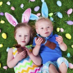 Thumper Massager Kids eating chocolate rabbit on Easter egg hunt